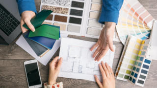 communication designer and customer. choice of colors and materials. selection of design elements for new interior repair. Work of designer and client