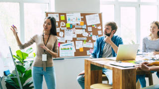 Successful confident modern young business man conducting a busi